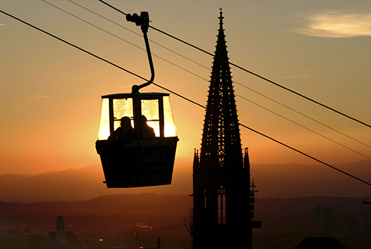 A gondola lift at sunset
